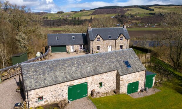 Distillery House has a fantastic games room in its barn and sits above the River Tummel. Image: Savills.
