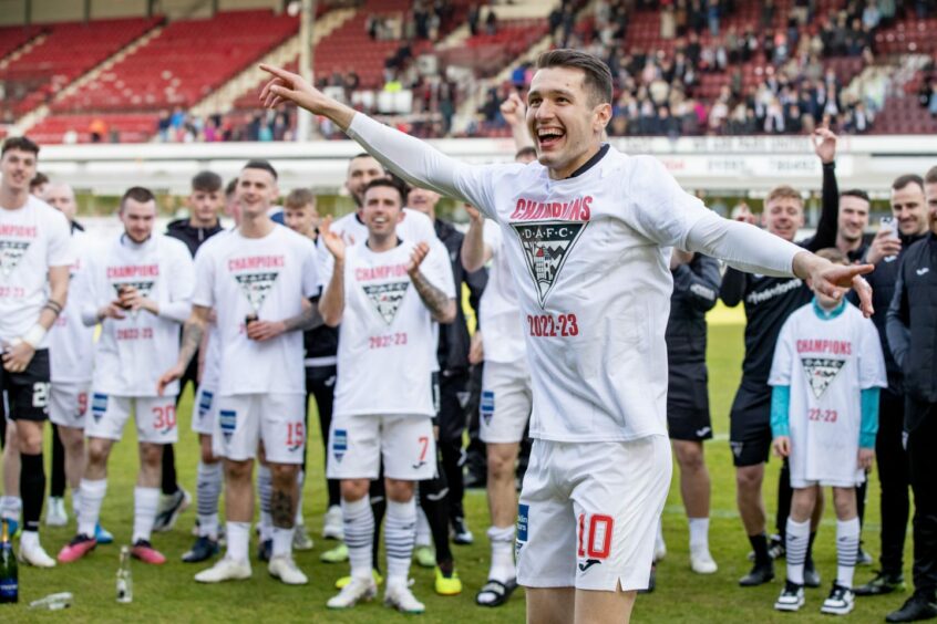 Nikolay Todorov celebrates Dunfermline's League One title win.