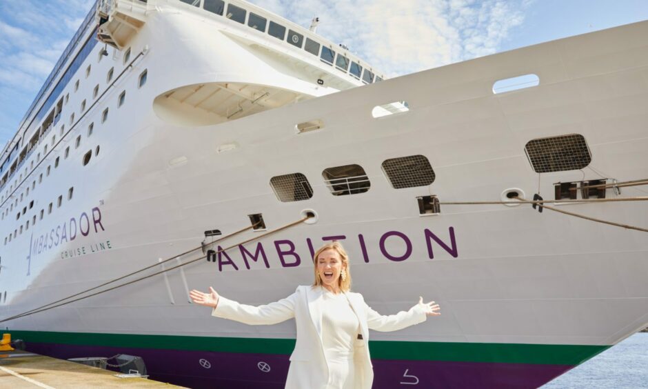 Godmother of the ship, Shirley Robertson, standing in front of Ambition