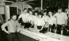 Staff getting ready to welcome customers on the opening night in 1983. Image: DC Thomson.