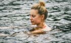 Cold water swimming in the River Tay helps to alleviate some of Hannah's chronic fatigue syndrome symptoms. Image: Supplied by Hannah Charles Picture shows; Hannah Charles in a river in Perthshire. Perthshire. Supplied by Hannah Charles