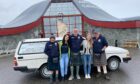 Alan Falconer, Stephen Woods and Archie Cook with staff at the Arctic Circle Centre in northern Norway. Image: Scots to the Arctic