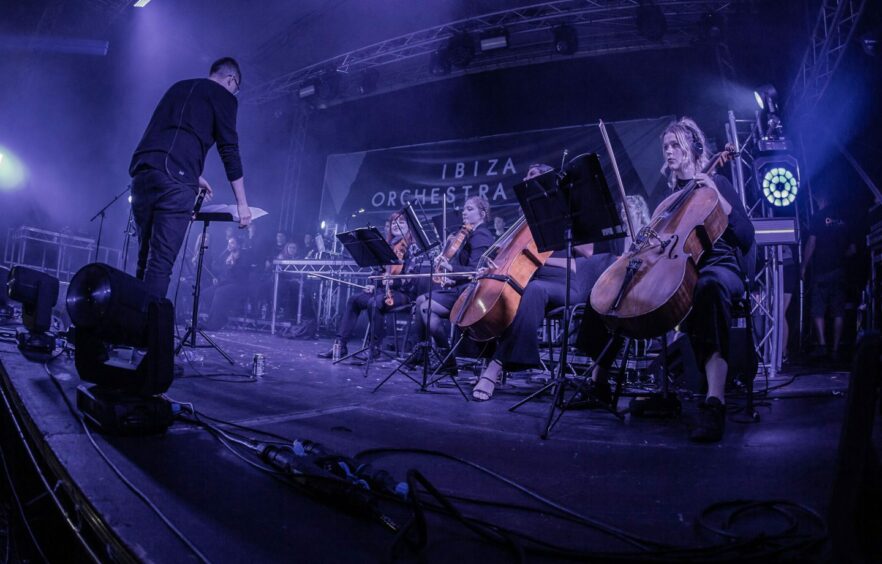 The 26-piece Ibiza Orchestra Experience during a gig.