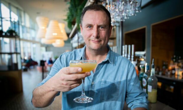 Les Johnson has launched a cocktail fundraising for cancer research and Dundee families affected by cancer at the Apex Hotel. Image: Kim Cessford / DC Thomson.