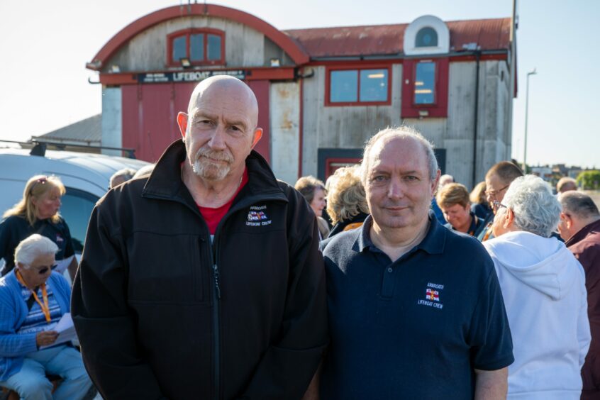 Arbroath lifeboat crew members at harbour protest meeting