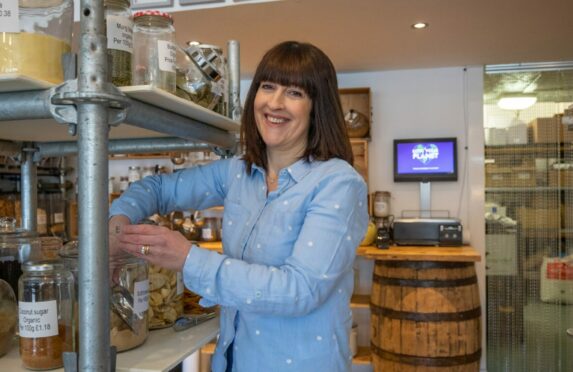 Debbie Gallacher, owner of Love Your Planet in Broughty Ferry, at her store with her zero waste baking bags. Image: Kim Cessford / DC Thomson.