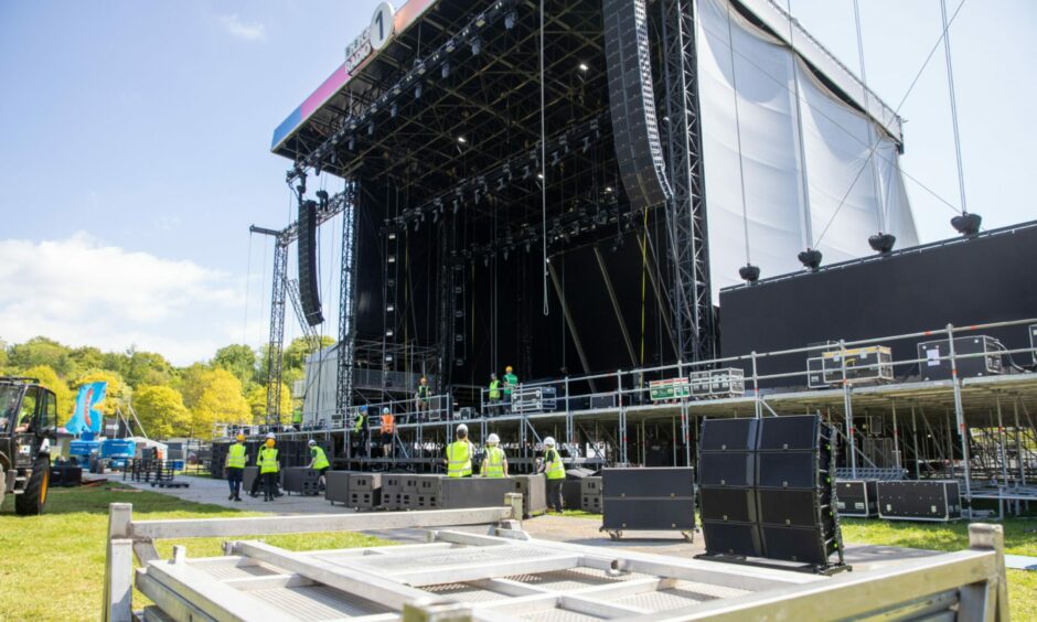 Workers setting up the Main stage at the Big Weekend site in Dundee.