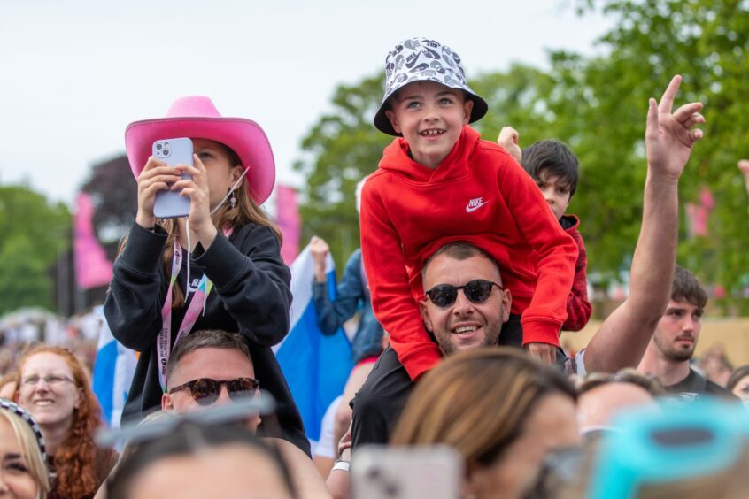 Young fans enjoying the main stage at the Big Weekend.