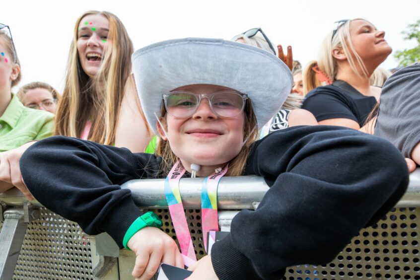 A girl wearing a cowboy hat in the crowd at Radio 1's Big Weekend in Dundee