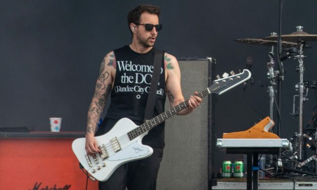 Nothing but Thieves guitarist wears t-shirt saying Welcome to the DCC (Dundee City Council) at Big Weekend.