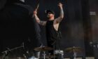 Royal Blood drummer Ben Thatcher tries to gee up the Big Weekend crowd. Image: Kim Cessford/DC Thomson