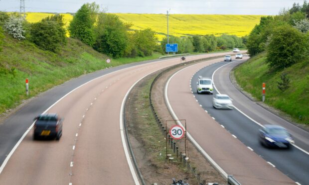 The M90 in Fife with a 30mph speed sign