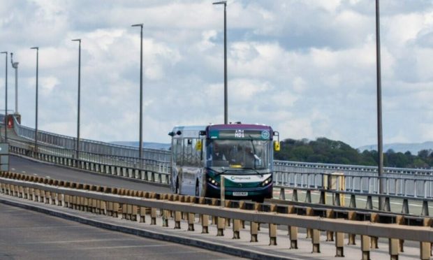 The 'driverless' - or autonomous - bus as it heads over the Forth Road Bridge.