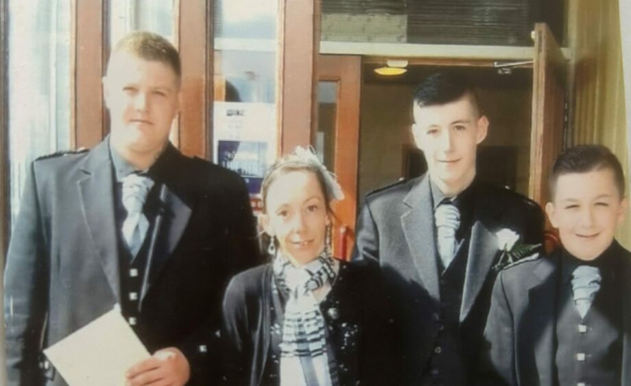 Wendy Nelson with sons Keiran, Derek MacDonald and Declan MacDonald