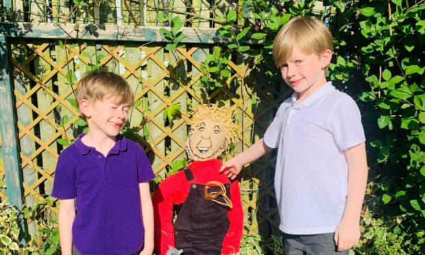 Callan, 8, and Blair, 6, with Oor Wullie.