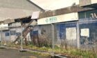 A row of derelict shops on Macalpine Road in Dundee