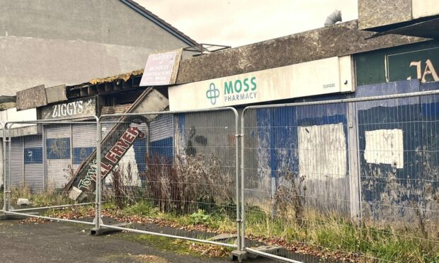 A row of derelict shops on Macalpine Road in Dundee