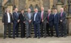 Lindsays managing partner Alasdair Cummings flanked by John Thom and chief operating officer Ian Beattie with new partners joining the legal firm in Dundee. Image: Lindsays.