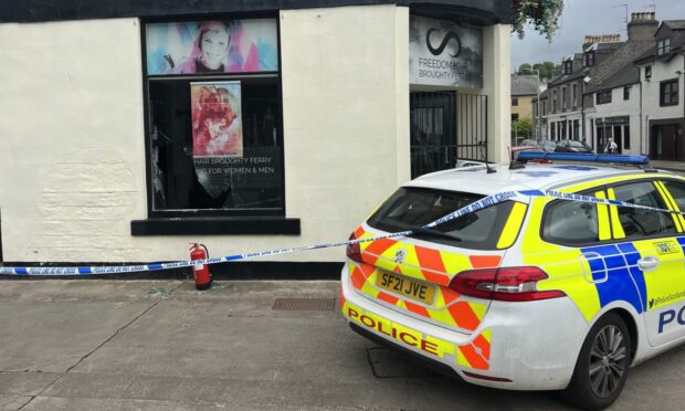 Police outside Freedom Hair in Broughty Ferry after a break-in on Monday