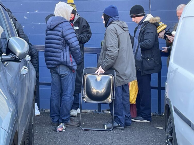 Dundee fans came prepared for the long wait. 