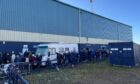 Dundee fans queueing outside Dens Park on Monday