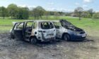 Two burnt-out cars in Caird Park, Dundee