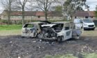 Picture shows two burnt out cars in Caird Park, Dundee.