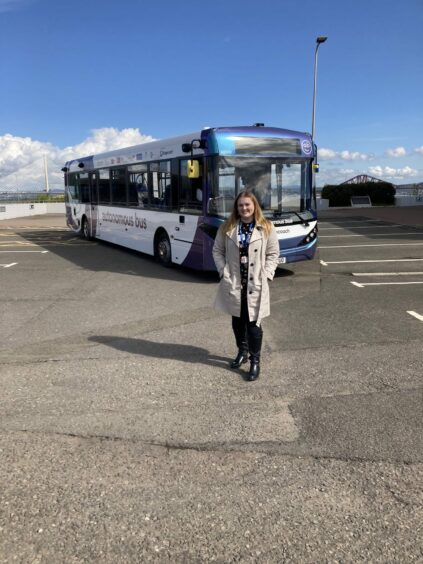 Joanna in front of the 'driverless' bus Fife is about to be met with once it heads over the bridge.
