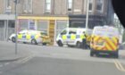Police on High Street in Lochee after a disturbance. Image: Supplied
