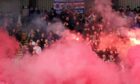Rangers fans set off flares prior to kick-off in the cinch Premiership match at McDiarmid Park, Perth.