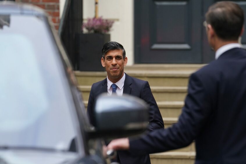 Prime Minister Rishi Sunak leaves Conservative Party HQ in London