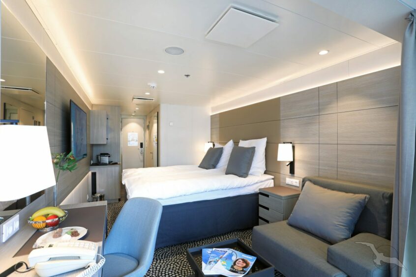 A bedroom on board Artania cruise ship