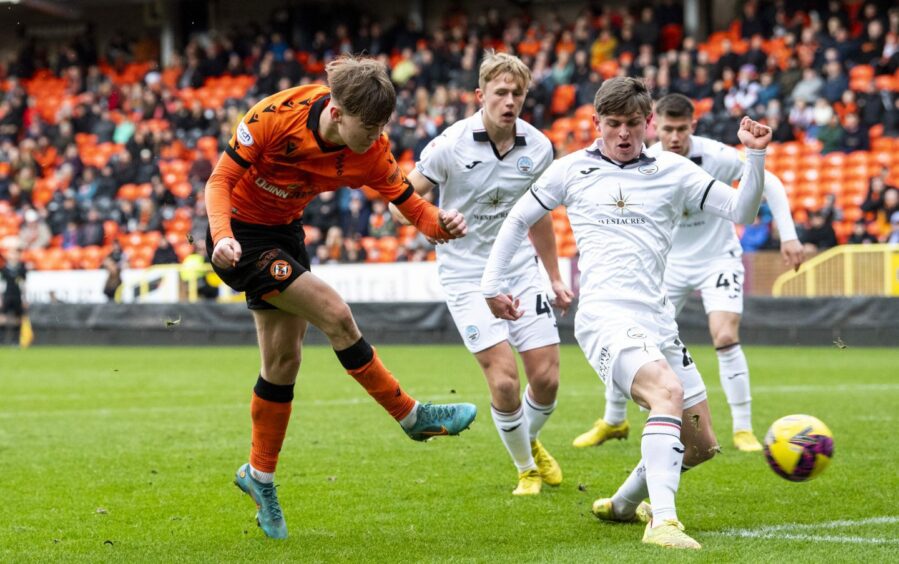 Rory MacLeod goes for goal against Swansea City. Image: SNS