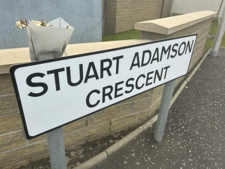 The Stuart Adamson Crescent street sign