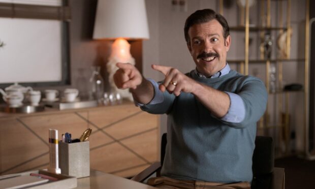 Jason Sudekis as Ted Lasso.