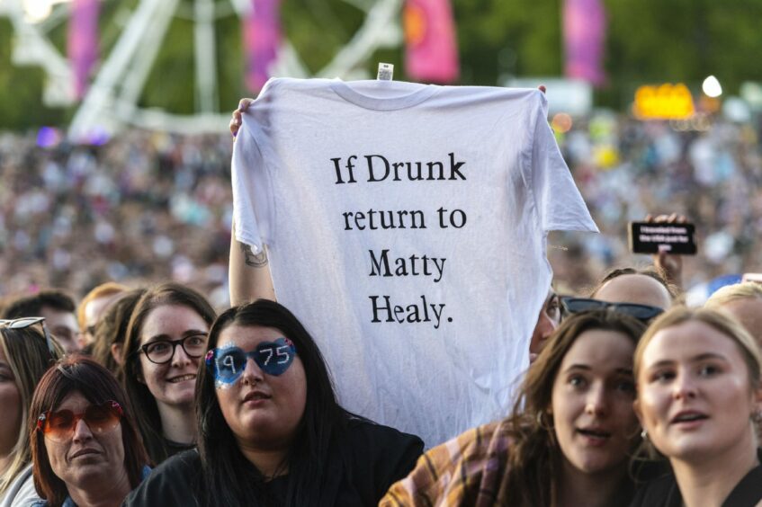 Fans watch The 1975 performing on the main stage during BBC Radio 1's Big Weekend at Camperdown Park in Dundee. Image: PA Wire.