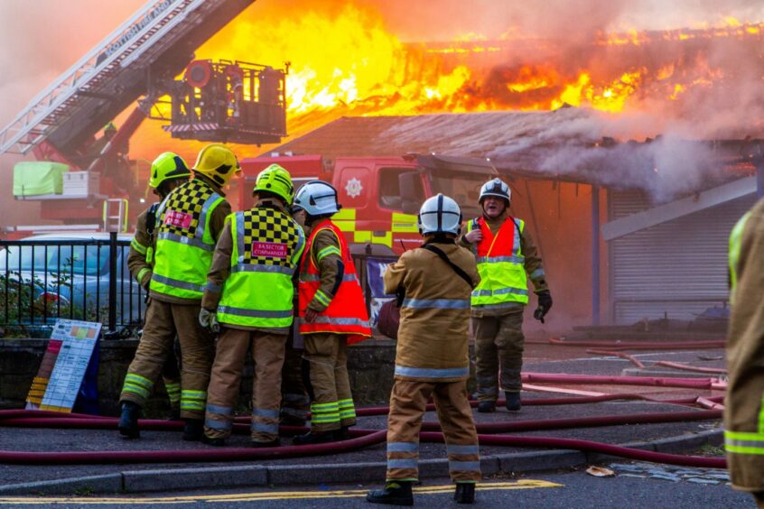 Dundee firefighters in action at the Hilltown Indoor Market in 2018. 