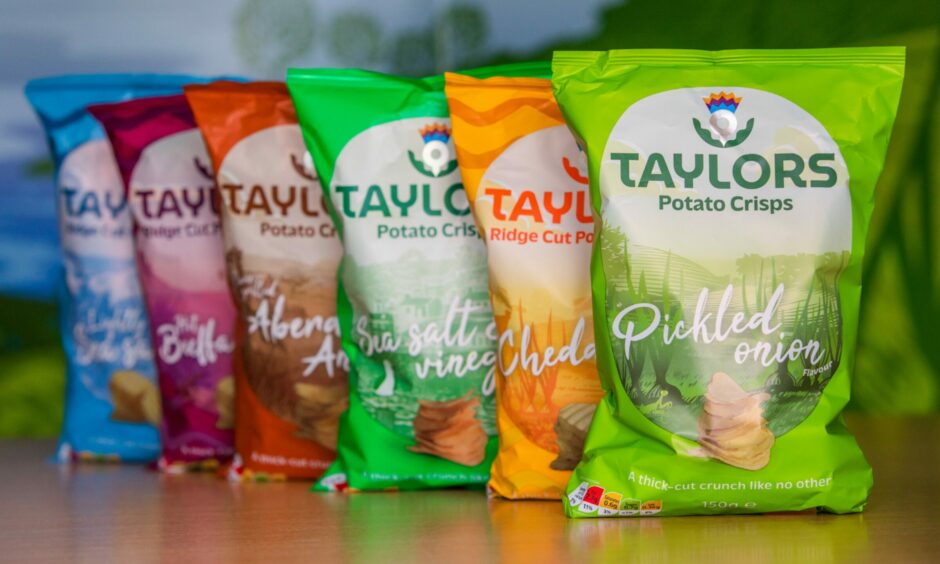 Different colour packets of Taylors Snacks potato crisps.