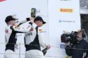 Sandy Mitchell soaks teammate Shaun Balfe during the Silverstone 500 podium celebration. Image: McMedia