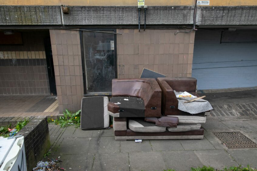 Dumped furniture outside Abbotsford Court in Glenrothes.