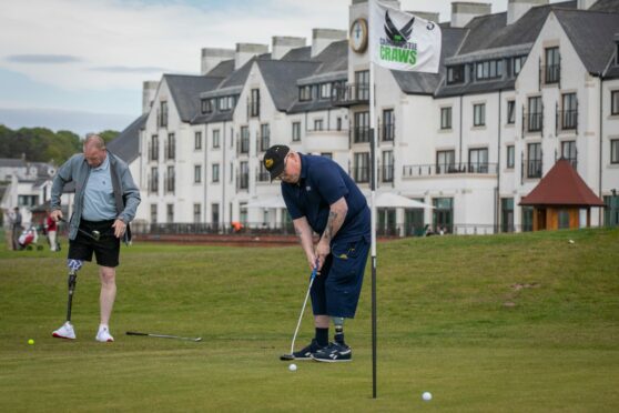 Amputee golfers Cavin Clancy (left) and Steve Bacala at Carnoustie's Championship course Image: Steve Brown/DC Thomson