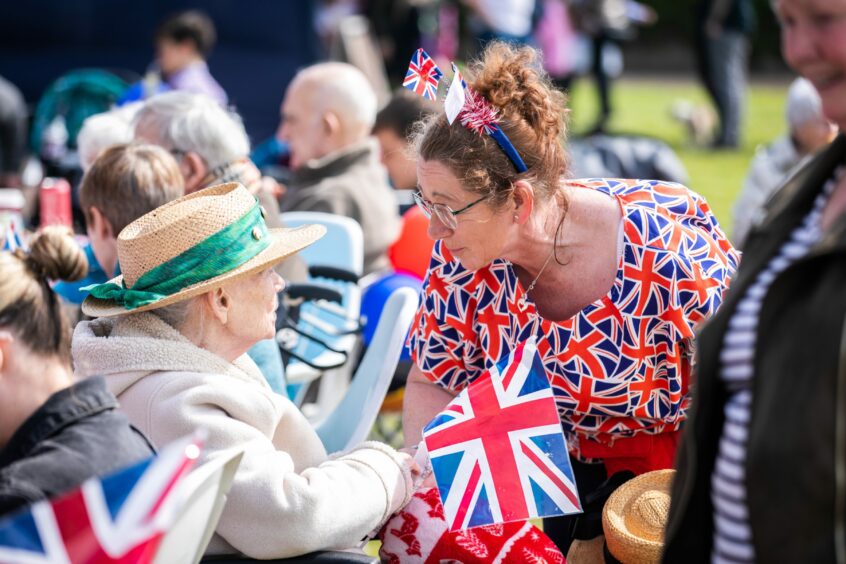 Anne Pettit speaks to activity coordinator Vicki Dodds from Leven Beach Nursing Home at the Leven Coronation Big Picnic.