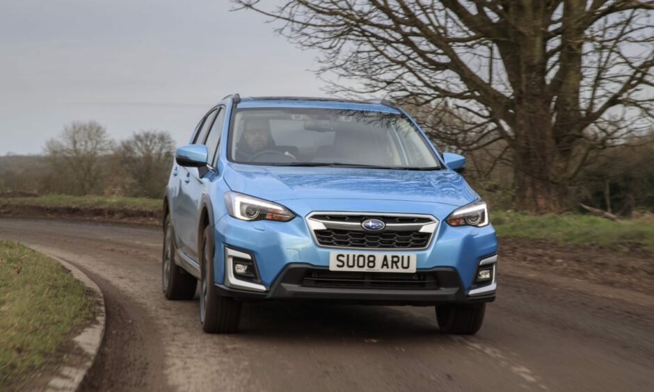 We liked the XV's chunky styling. The car is pictured taking a bend. Image: Subaru.