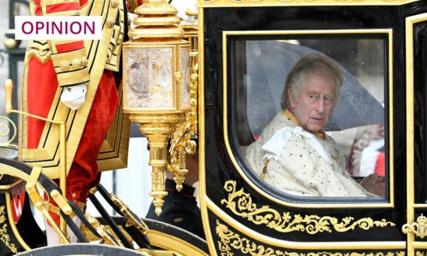 King Charles in royal coach on his way to the coronation