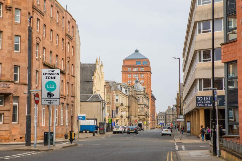 What the Dundee Low Emission Zone could look like. A view of Ward Road Street with a sign that reads "Low Emission Zone LEZ Exemptions apply". 