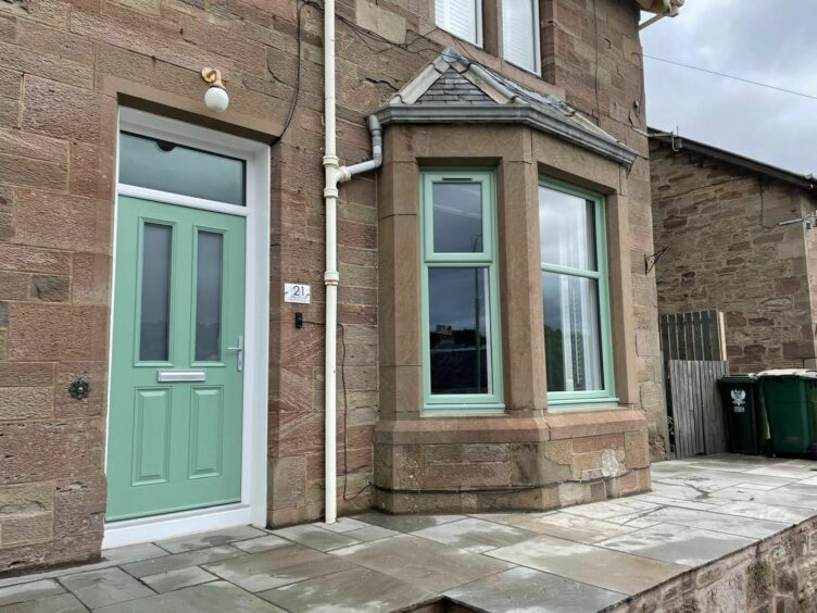 A photo of home with Highland Homestyle windows and door