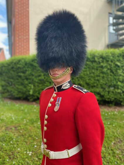 Angus guardsman Cameron Keith is part of the King's coronation parade.