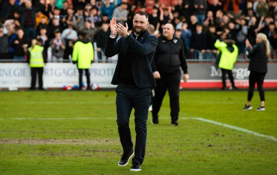 Dunfermline boss James McPake salutes the fans at East End Park after a game