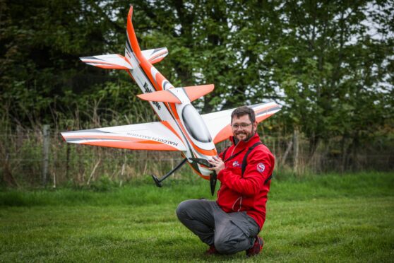 British precision aerobatics Malcolm Balfour with his Epilogue aircraft.  Image: Mhairi Edwards/DC Thomson