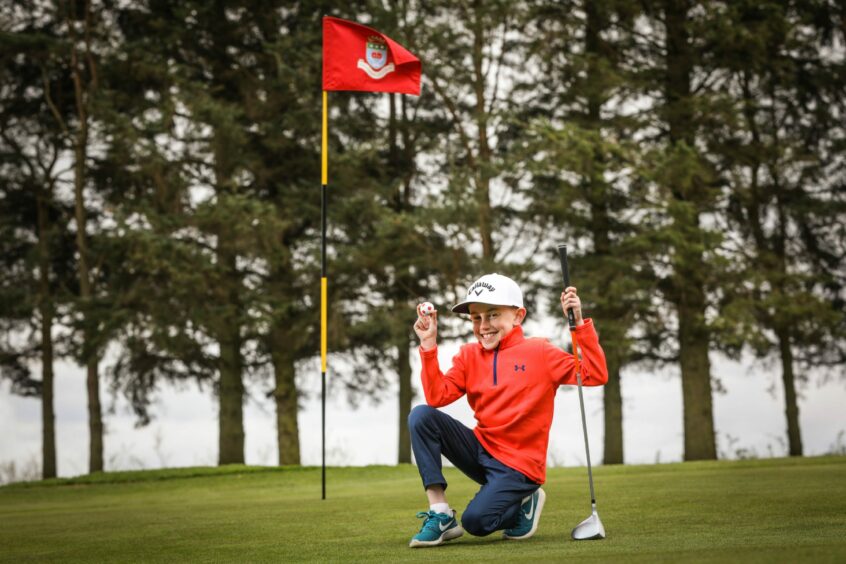 Kirriemuir 8-yr-old Noah Rooney hits hole-in-one.